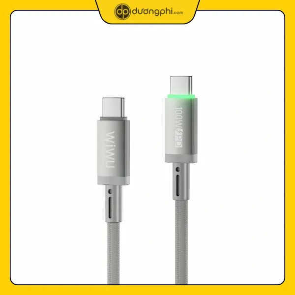 củ sạc wiwu 20w đặt cạnh đồng xu để so sánh kích thước